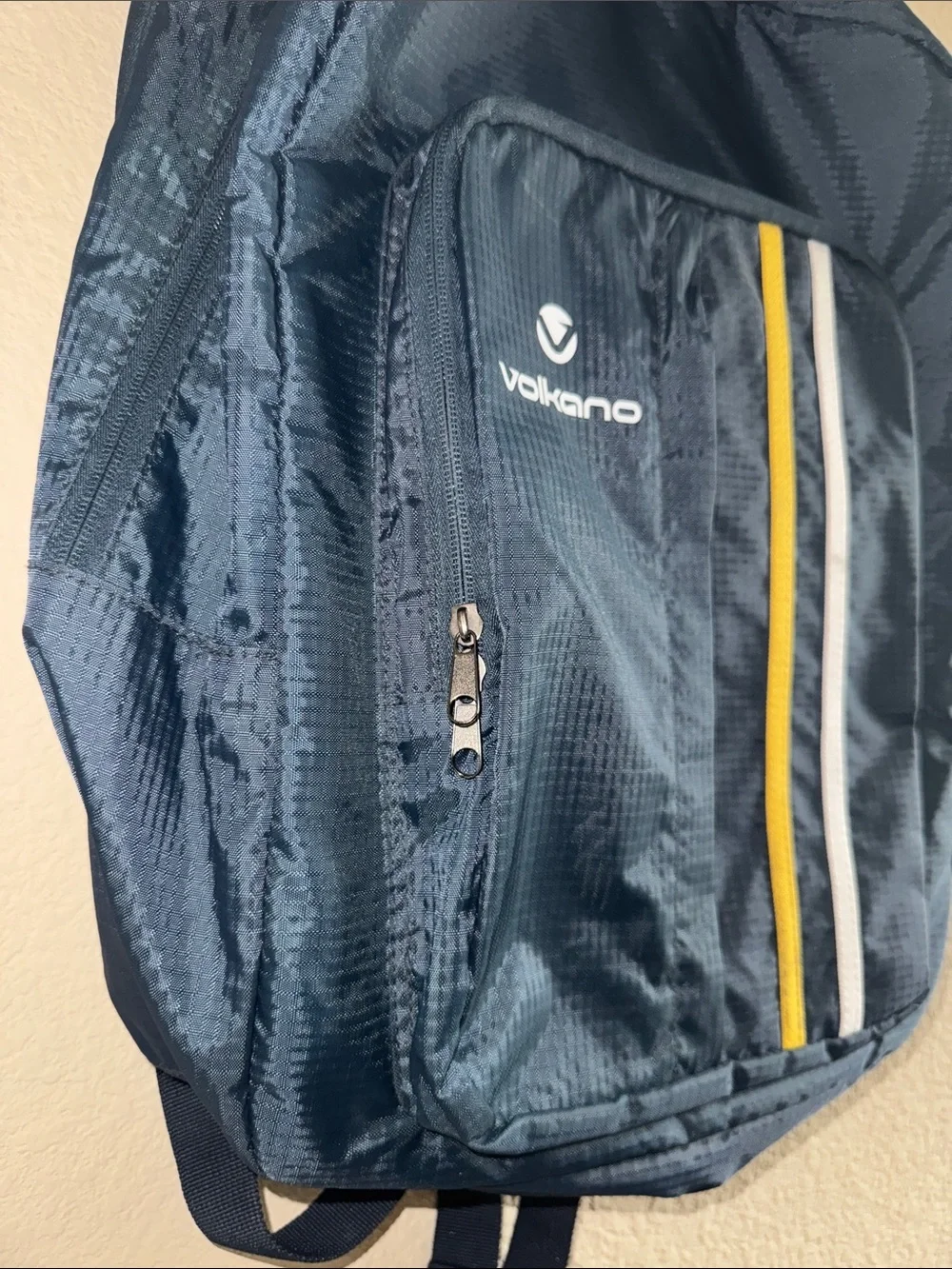 Volkano Track Series Backpack Featuring Vertical Yellow & White Accent Stripes